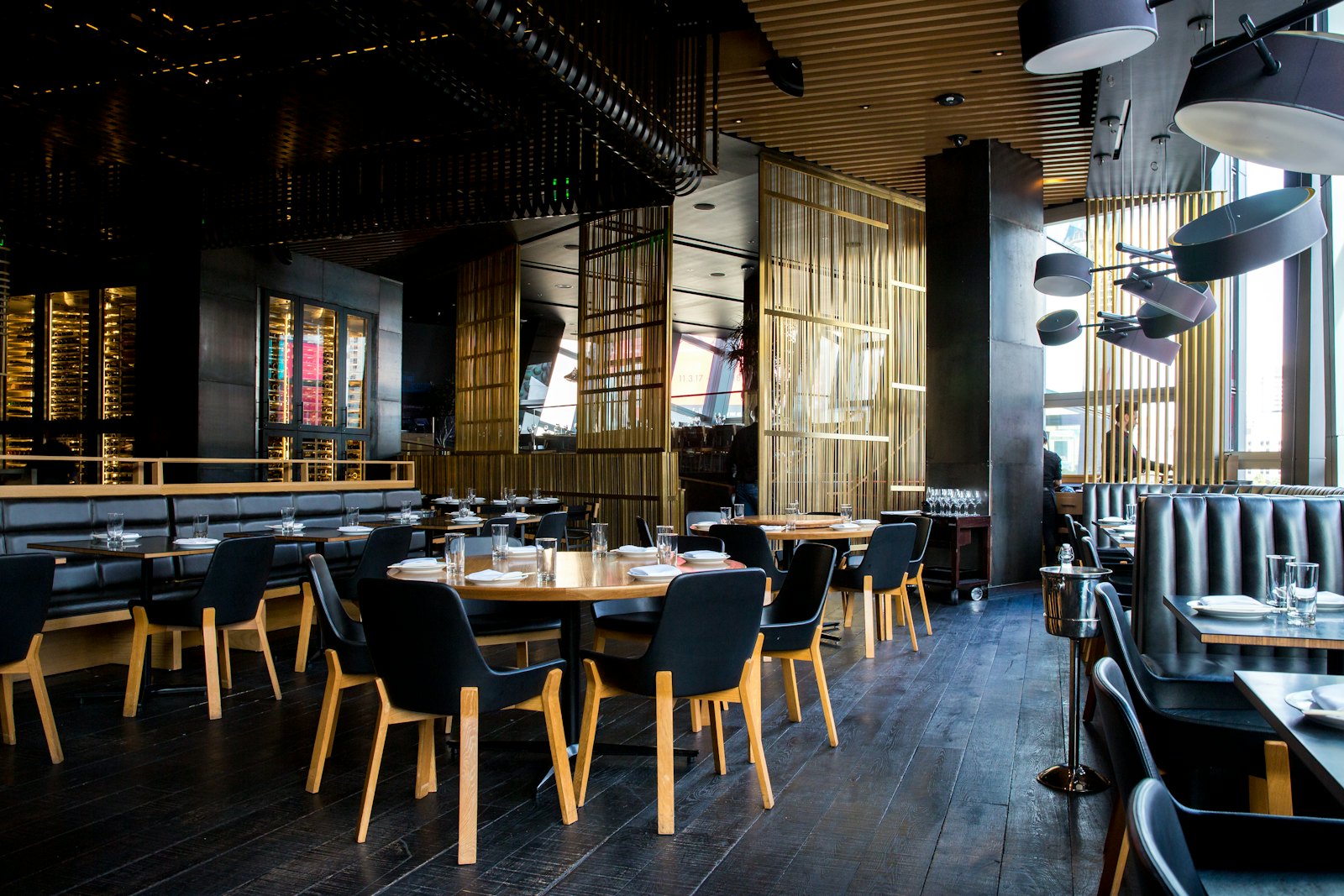 The warm, dark dining room